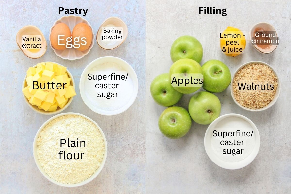 Ingredients for Hungarian Apple Pie (Almas Pite) sit on a gray surface.