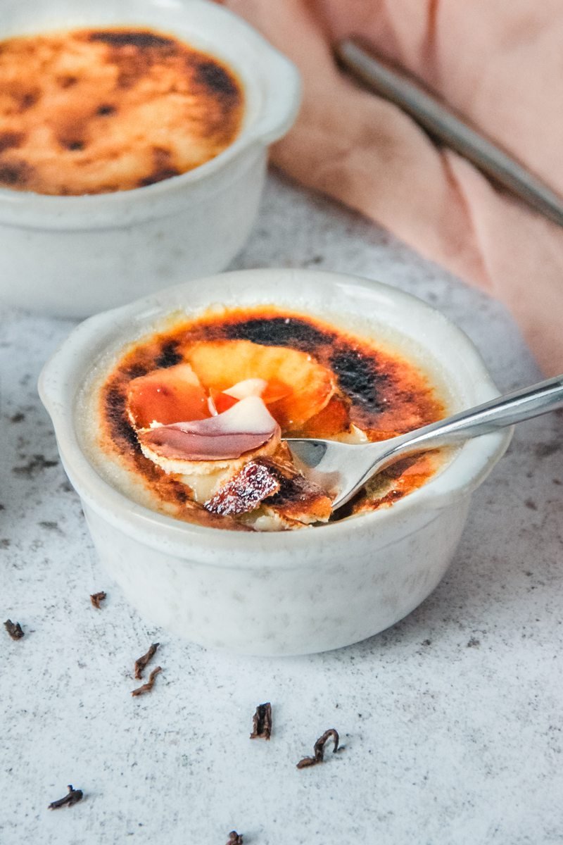 easy creme brulee with the caramelized sugar topping being spooned up