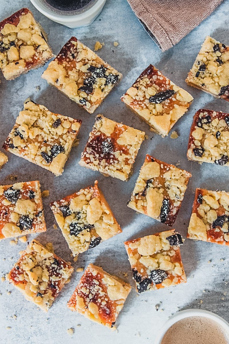 Squares of tan slice sit on a gray surface.