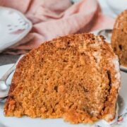 A serving of burnt sugar steam pudding is served up on an individual plate.
