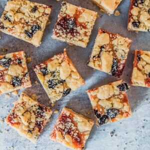 Squares of caramel tan slice sit on a gray surface.